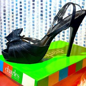 Almost new Black Satin Heel.